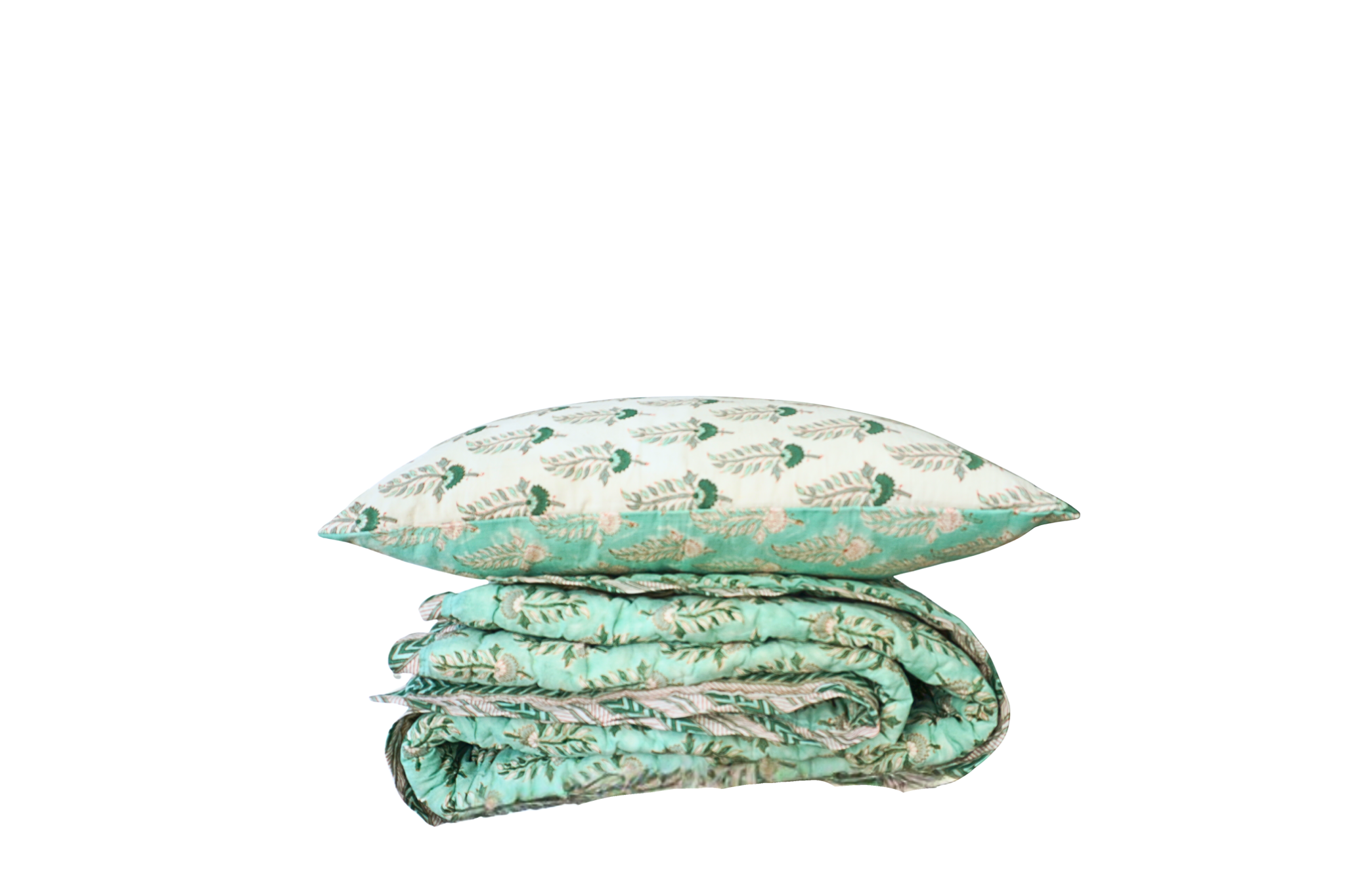 Meaningful handcrafted gift under $200 featuring a luxurious hand-quilted throw and coordinating pillow covers for design lovers.
