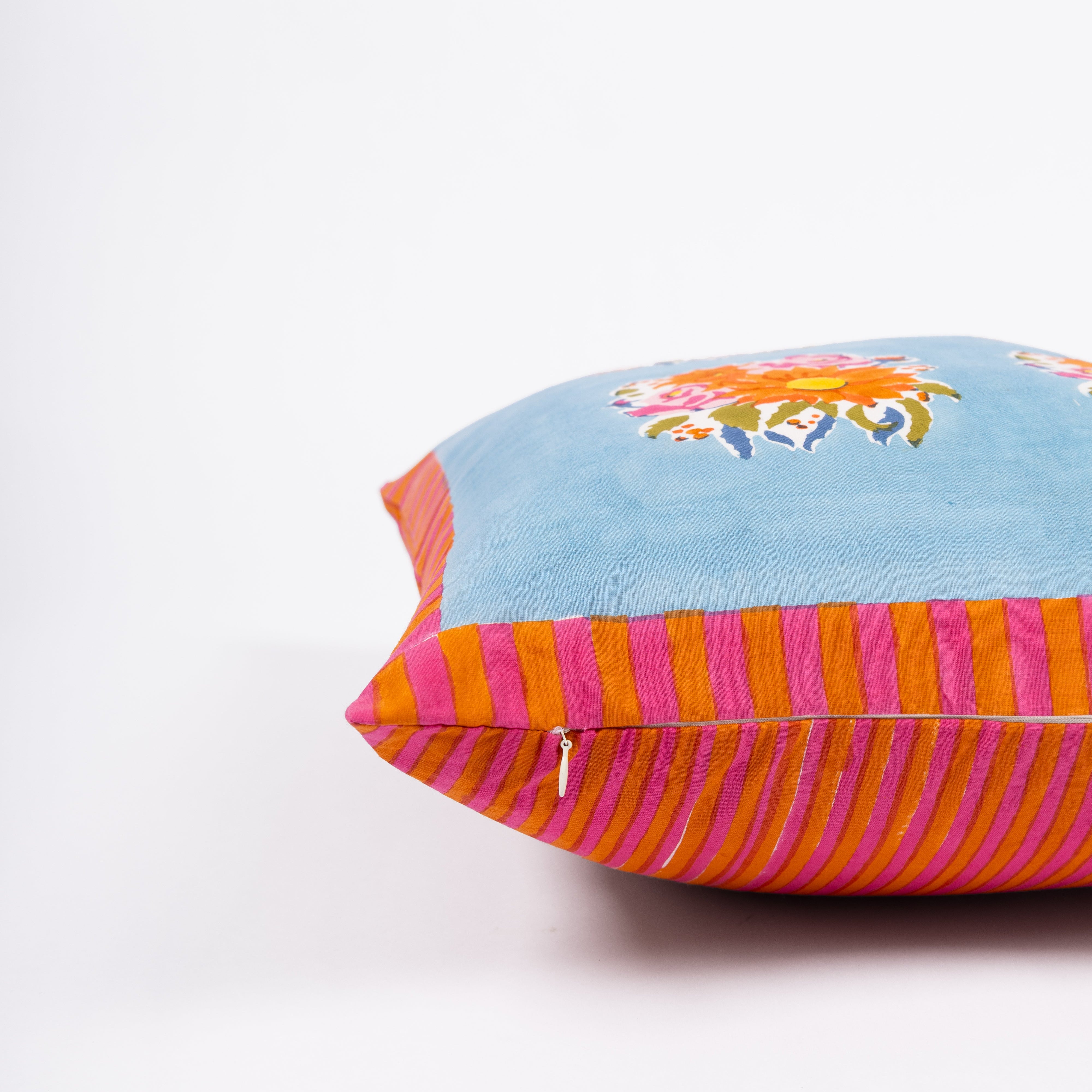 Artisan-made blue pillow cover crafted from pure cotton and Azo-free dyes, reflecting a commitment to responsible production.