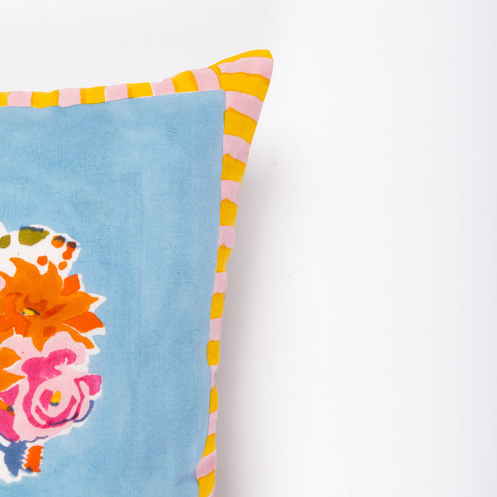 Artisan-made blue lumbar pillow cover crafted from pure cotton and Azo-free dyes for a sustainable, modern home.