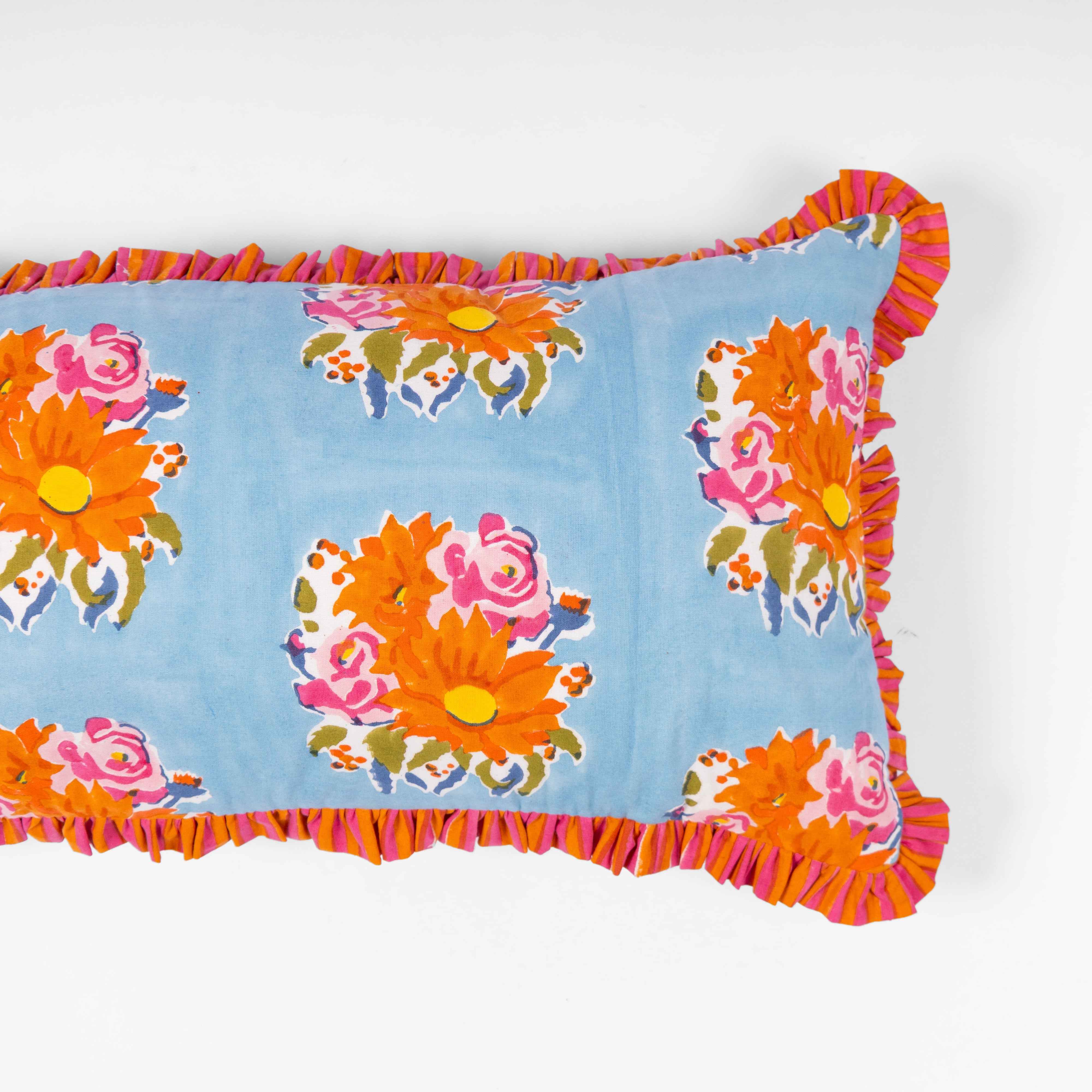 Artisan-made blue lumbar pillow cover crafted from pure cotton and Azo-free dyes for a sustainable, modern home.