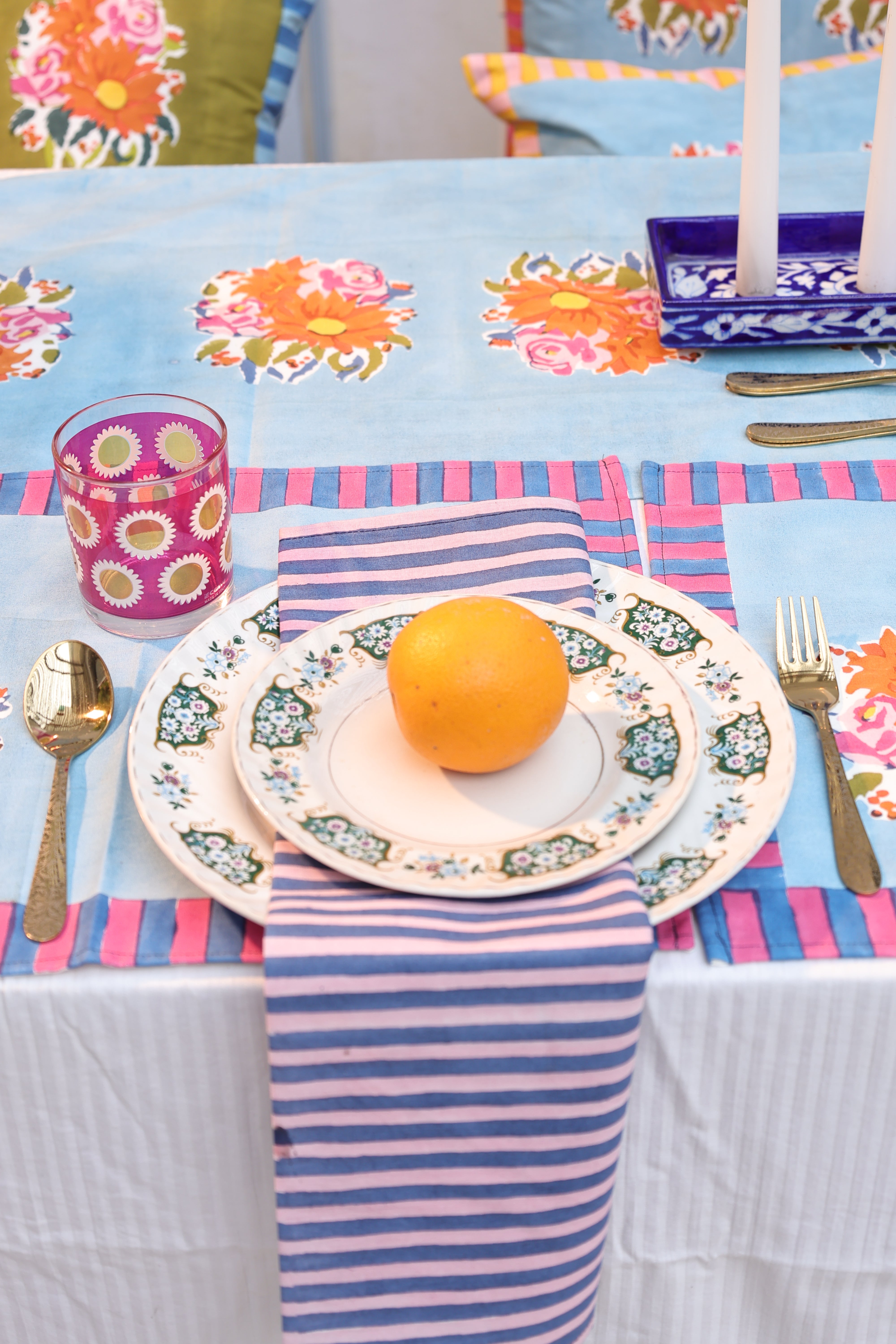 Artisan-made blue striped napkins crafted from pure cotton and Azo-free dyes, reflecting a commitment to responsible production in small batches.