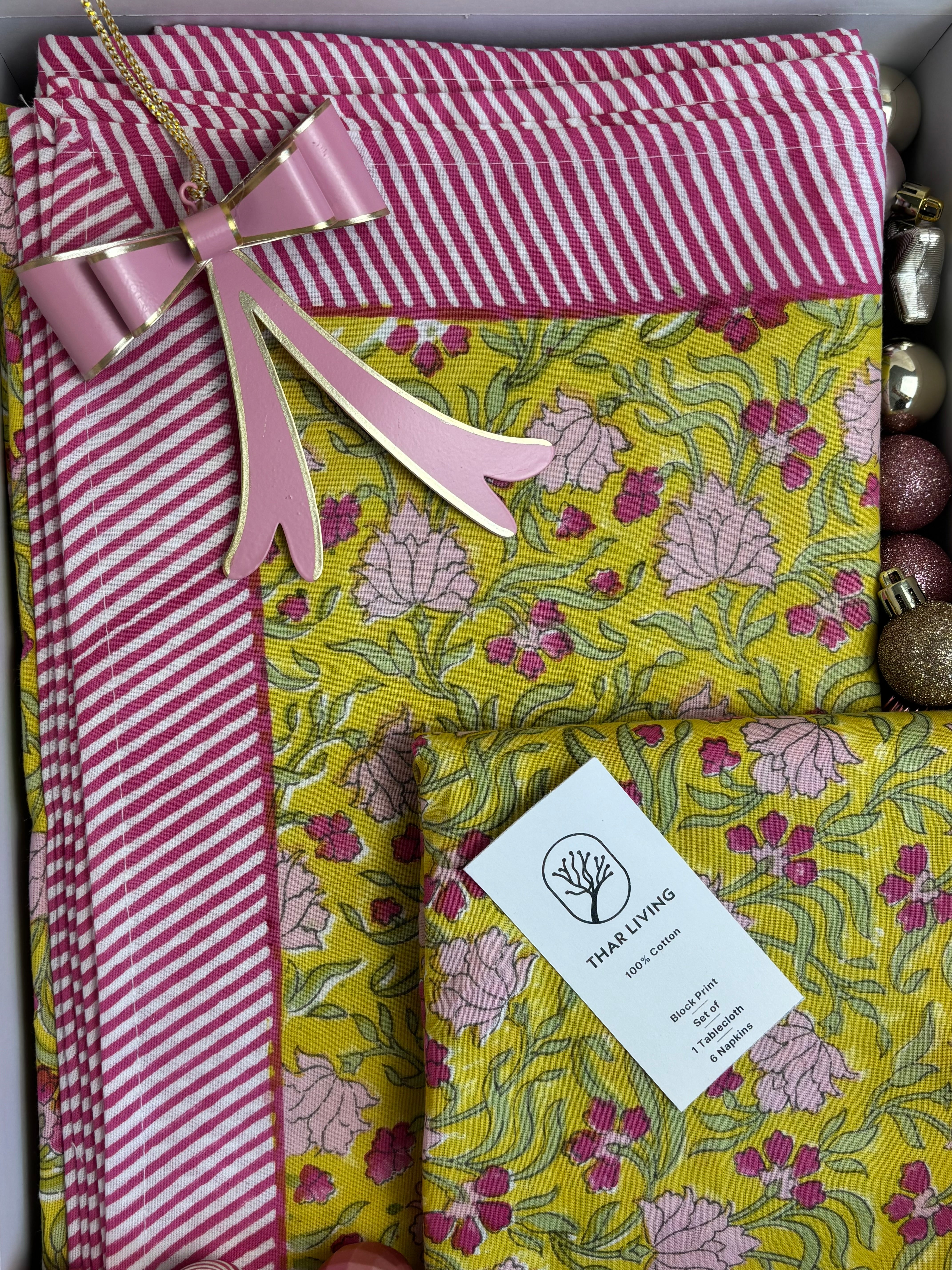 Artisan-made floral table cloth set handcrafted by skilled artisans in Rajasthan, India, using traditional wooden blocks.