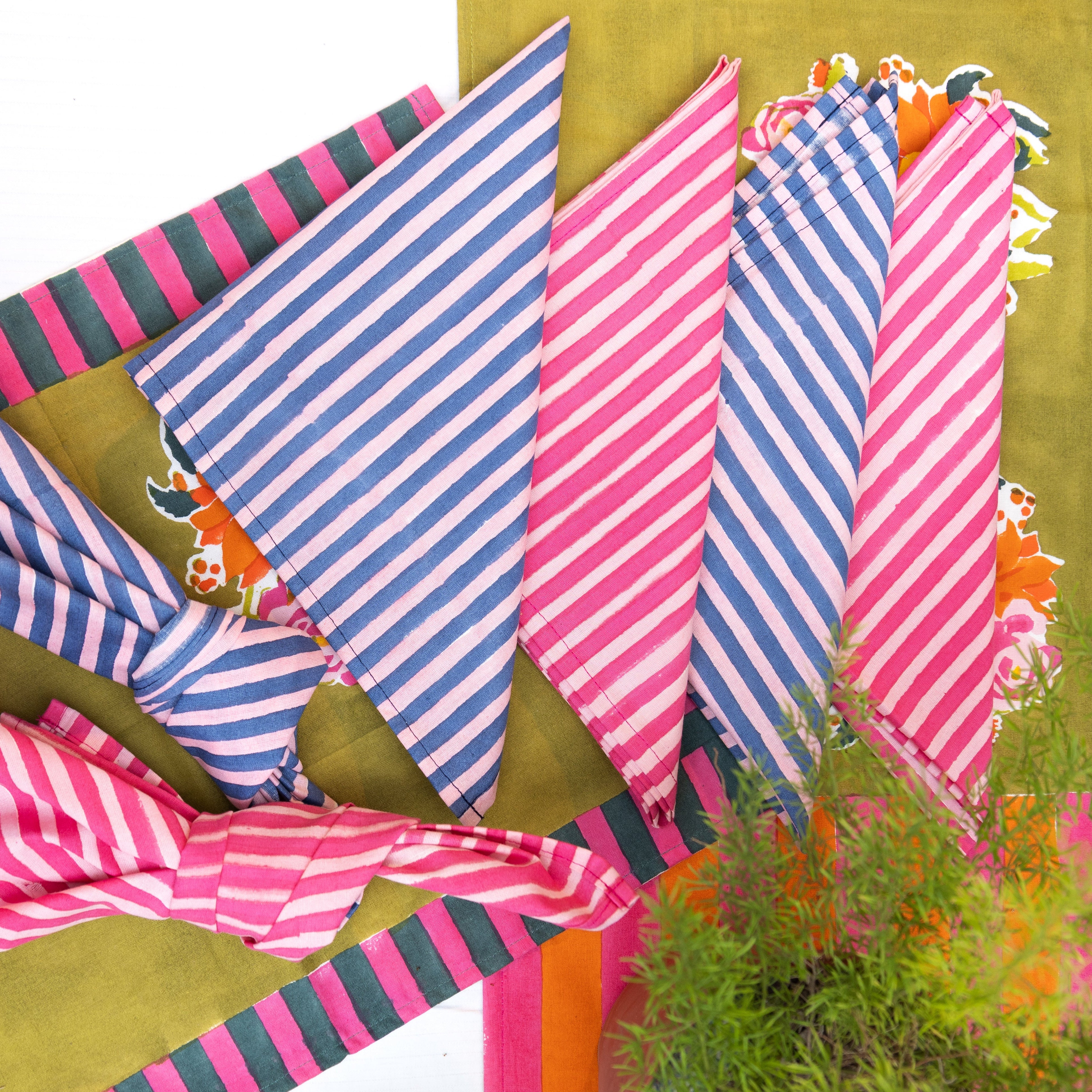 Gul blue hand block-printed cotton table napkins (set of 4) by Thar, featuring alternating bands of blue tones handcrafted by artisan communities.