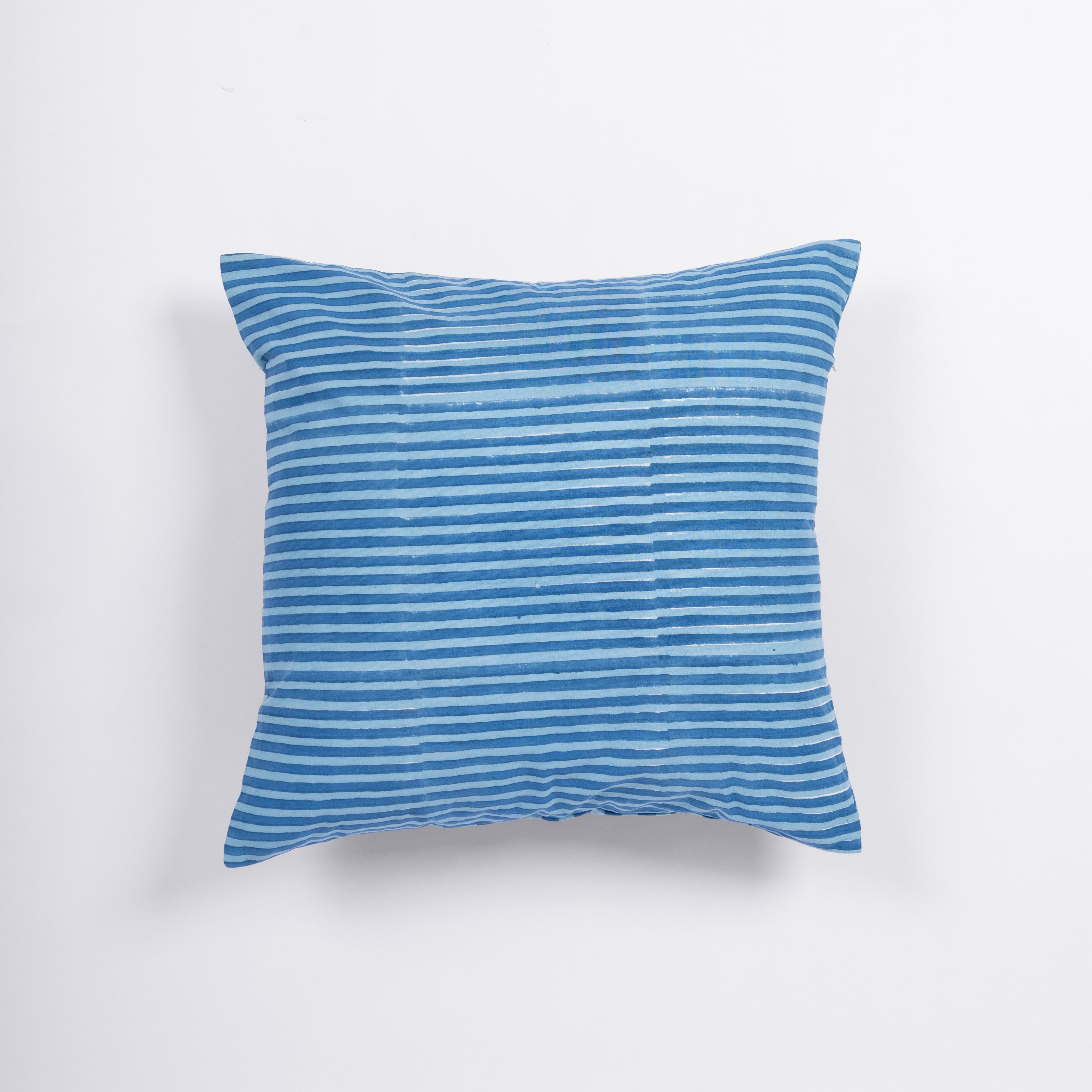 Handcrafted green cotton pillowcase by Thar, ethically produced in small batches to add "soul and story" to your home.
