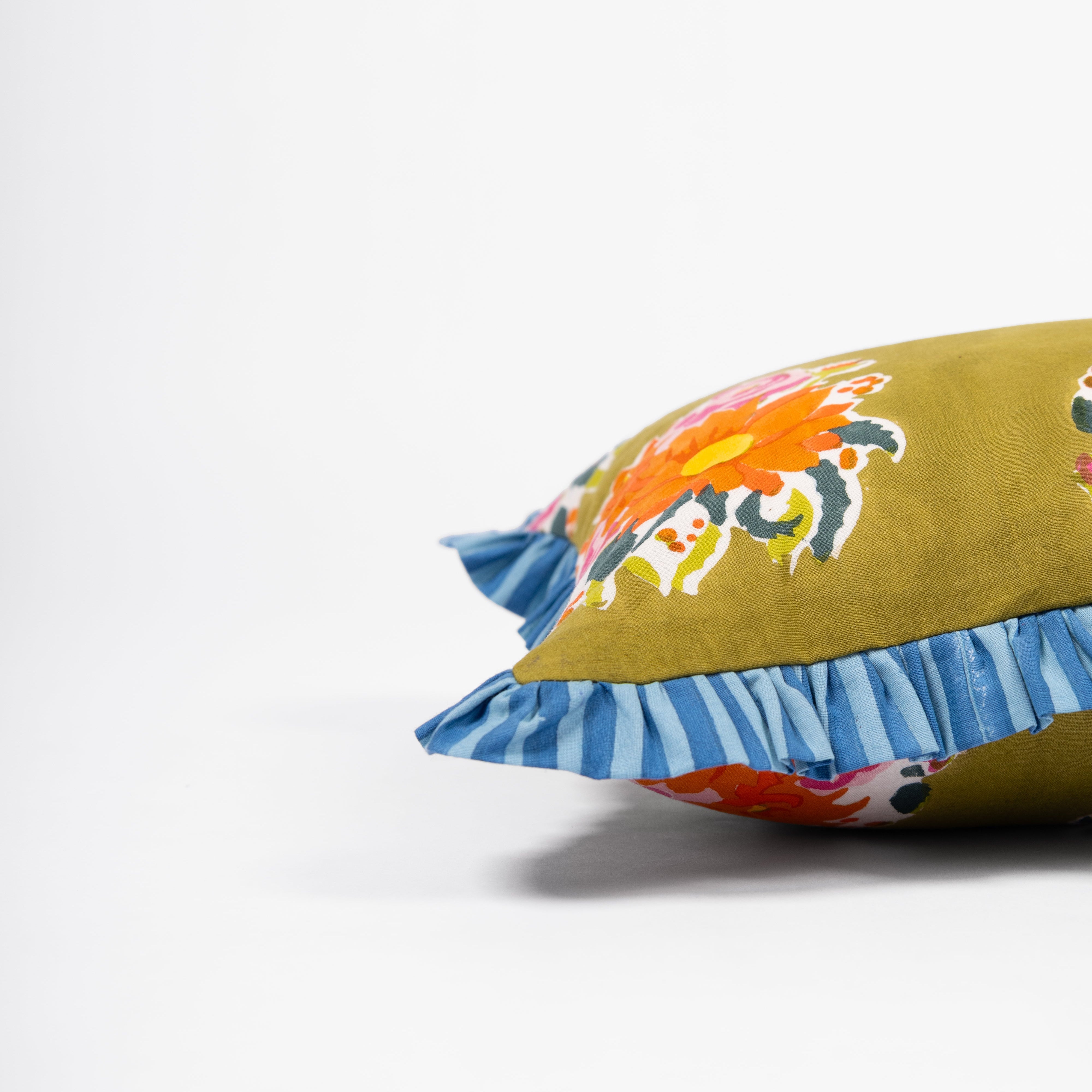 Artisan-made green lumbar pillow cover crafted from pure cotton and Azo-free dyes for a sustainable, modern home.